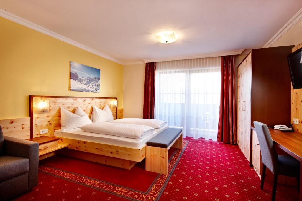 Hotel Erlebniswelt Stocker Schladming Pokoj fotografie